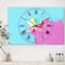 Designart 'Pink And Blue Banana Large Modern Multipanel Wall Clock